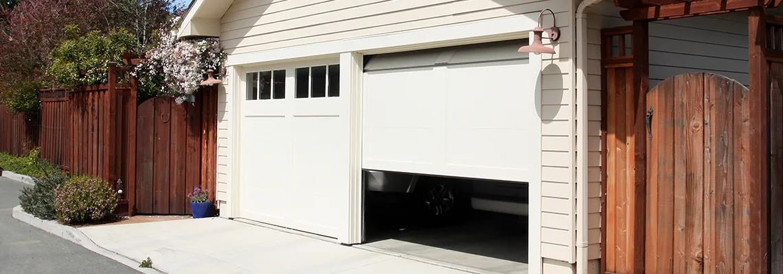 Fix Metal Garage Door Jerking in West Chicago, Illinois